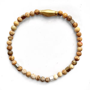 Beige jasper beaded bracelet. With gold and silver brass. Size 4mm.